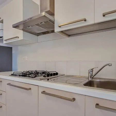 Apartamento Modern Flat With A Fenced Garden And Fireplace Bibione